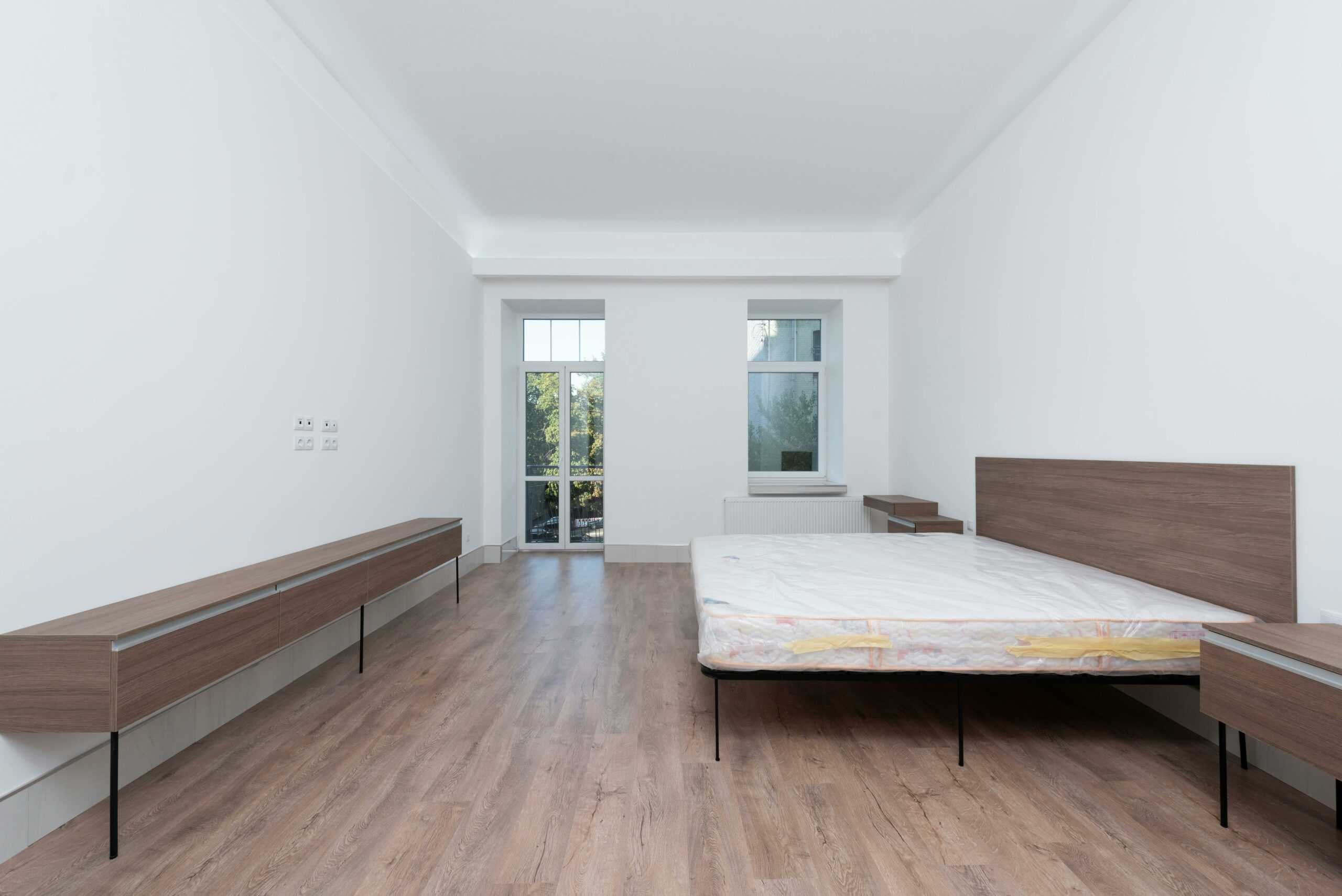 Kostenloses Stock Foto zu architektonisch, beistelltisch, bett